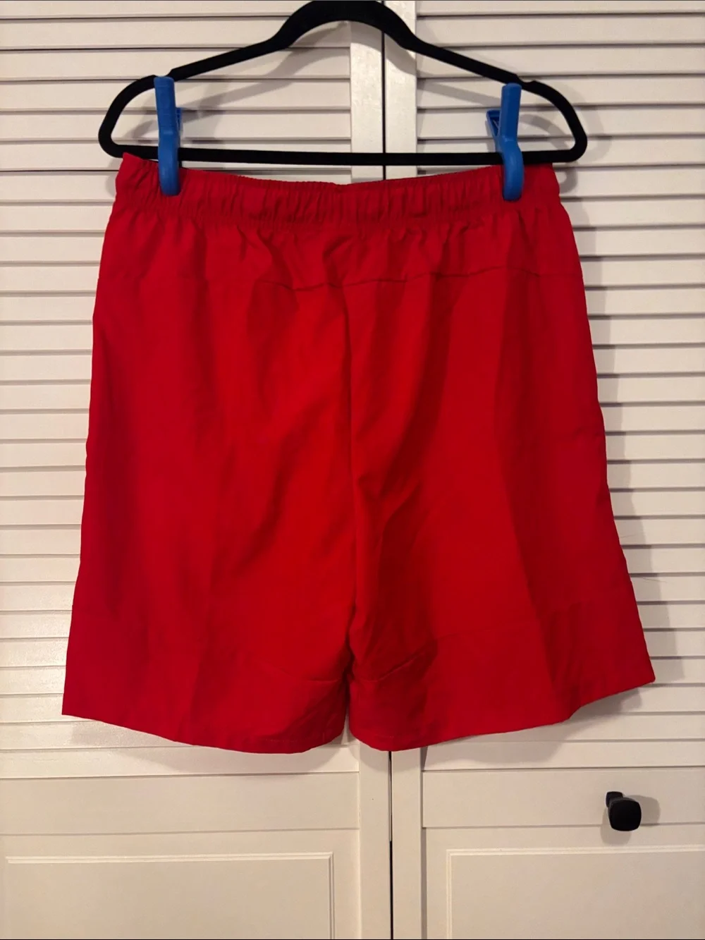 Nike Men's Red Athletic Drawstring Shorts with White Swoosh